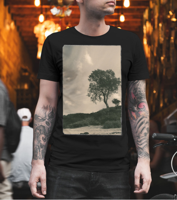 Tree on Grassy Hillside Under Cloudy Sky T-Shirt Tree on Grassy Hillside Under Cloudy Sky T-Shirt