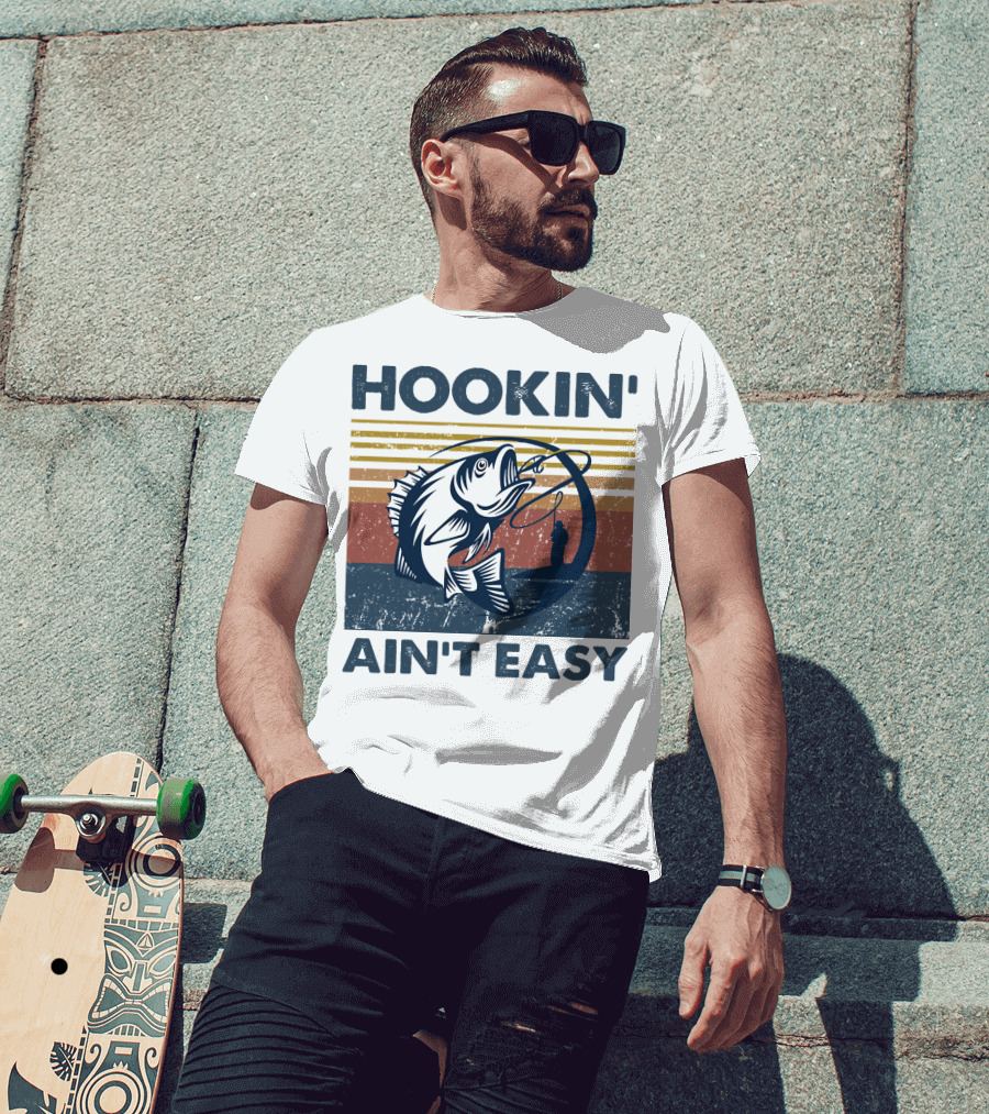 Hookin' Ain't Easy Vintage Fishing Graphic With Striped Sunset And Angler T-Shirt
