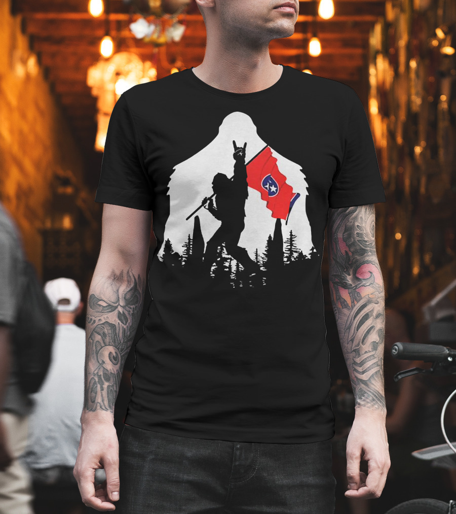 Bigfoot Silhouette with Rock and Roll Pose Holding Tennessee Flag in Forest T-Shirt