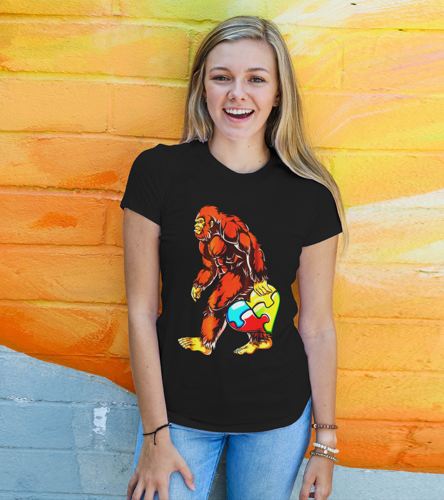 Bigfoot Holding Heart-Shaped Puzzle Piece For Autism Awareness T-Shirt