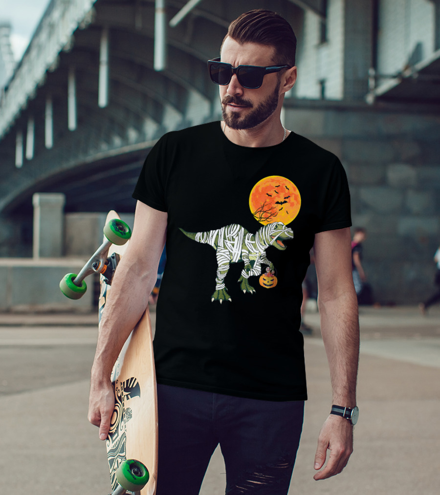 Dinosaur Halloween Mummy With Pumpkin And Full Moon Background T-Shirt