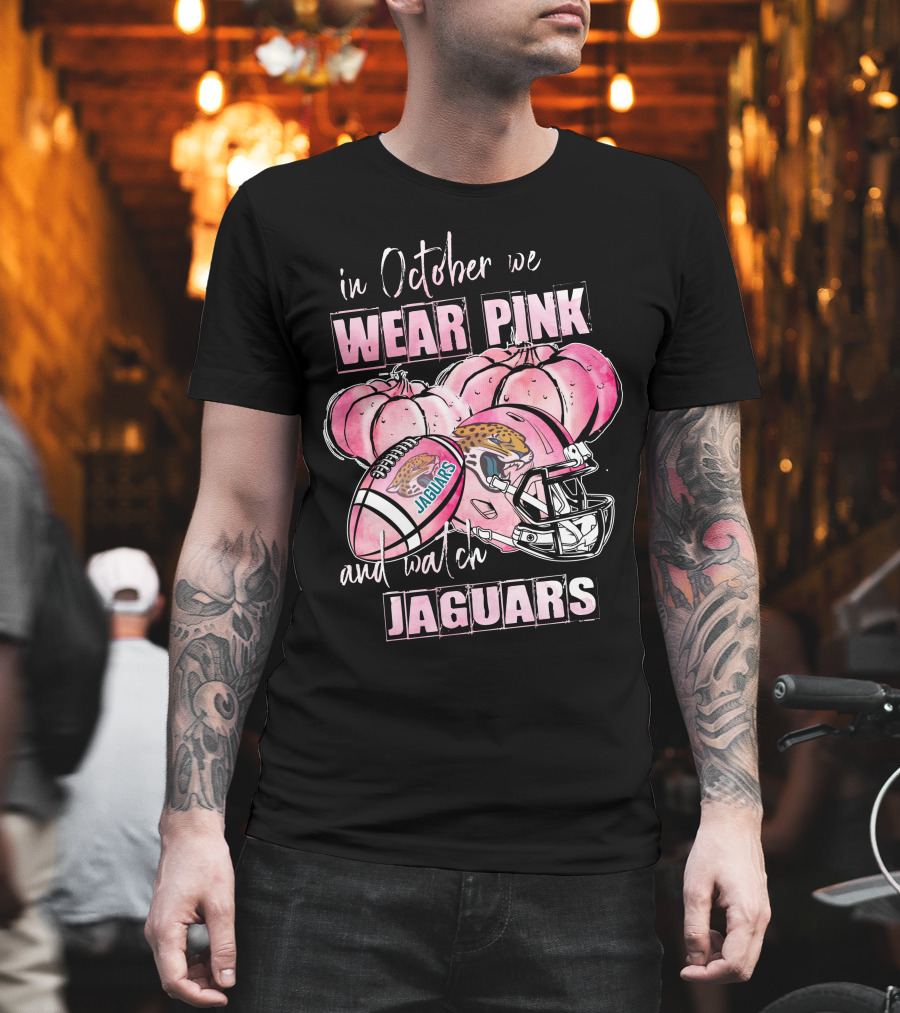In October We Wear Pink and Watch Jaguars Football Helmet Pumpkins T-Shirt