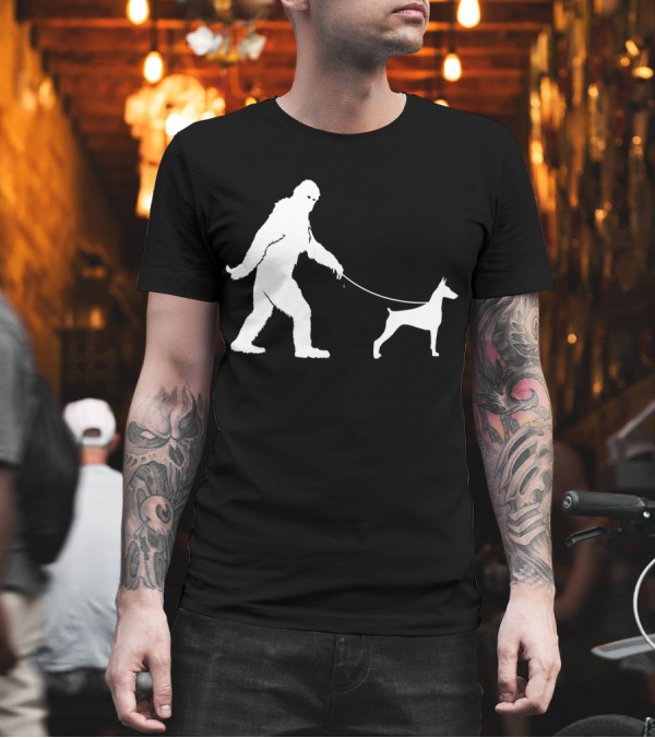 Bigfoot and Doberman Funny Cute Sasquatch Walking Dog T-Shirt Bigfoot and Doberman Funny Cute Sasquatch Walking Dog T-Shirt