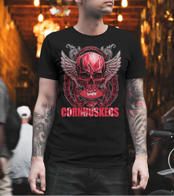 Nebraska Cornhuskers Winged Skull with Chain and Football Helmet Decor T-Shirt Nebraska Cornhuskers Winged Skull with Chain and Football Helmet Decor T-Shirt