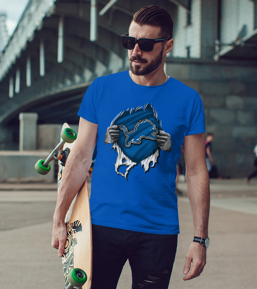 Torn DETROIT LIONS Logo Revealed Through Ripped Blue Fabric T-Shirt