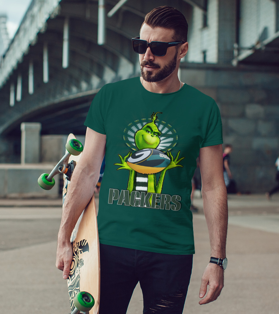 Grinch Holding Green Bay Packers Wilson Football T-Shirt