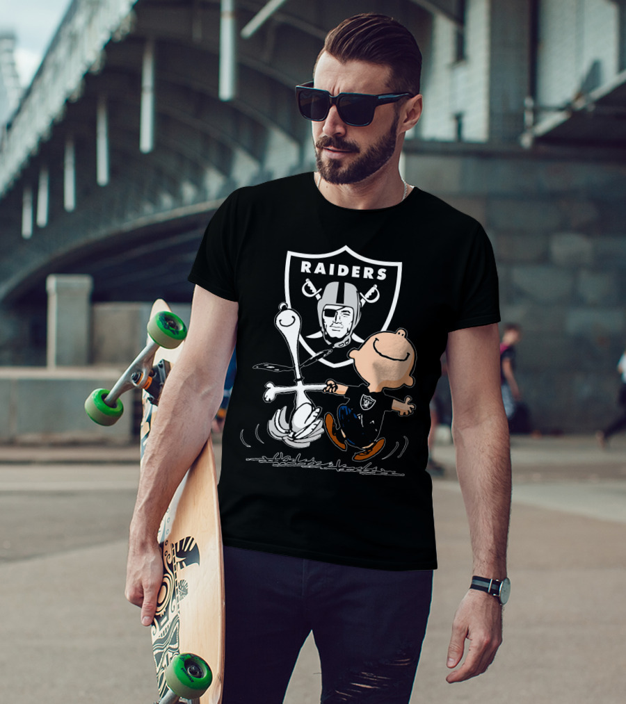 Snoopy And Charlie Brown Dancing In Front Of Oakland Raiders T-Shirt