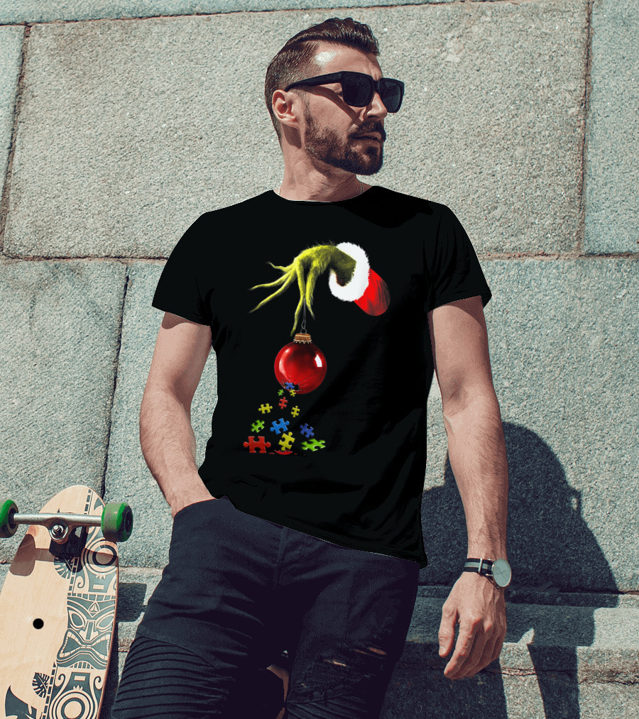 Grinch Hand Holding Red Ornament With Autism Puzzle Pieces T-Shirt