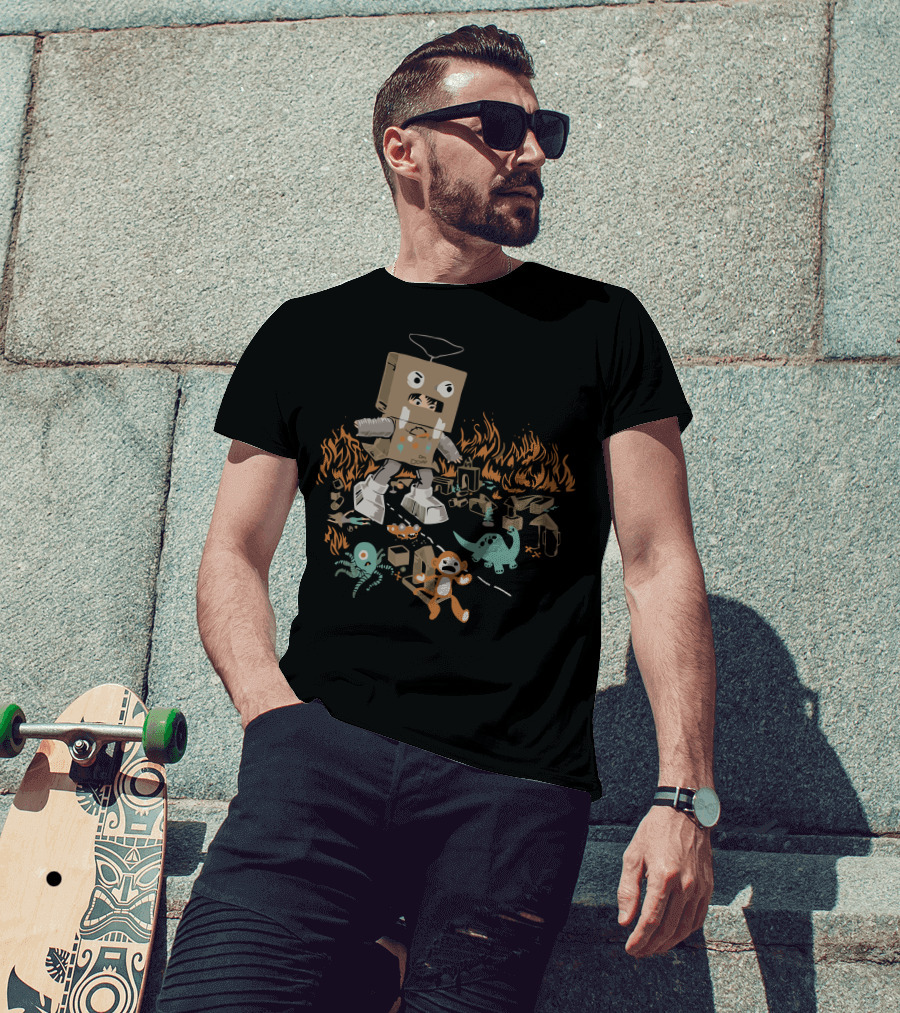 Robotron Cardboard Box Costume Stomps Over Toy Dinosaur And Alien Amidst Flames T-Shirt