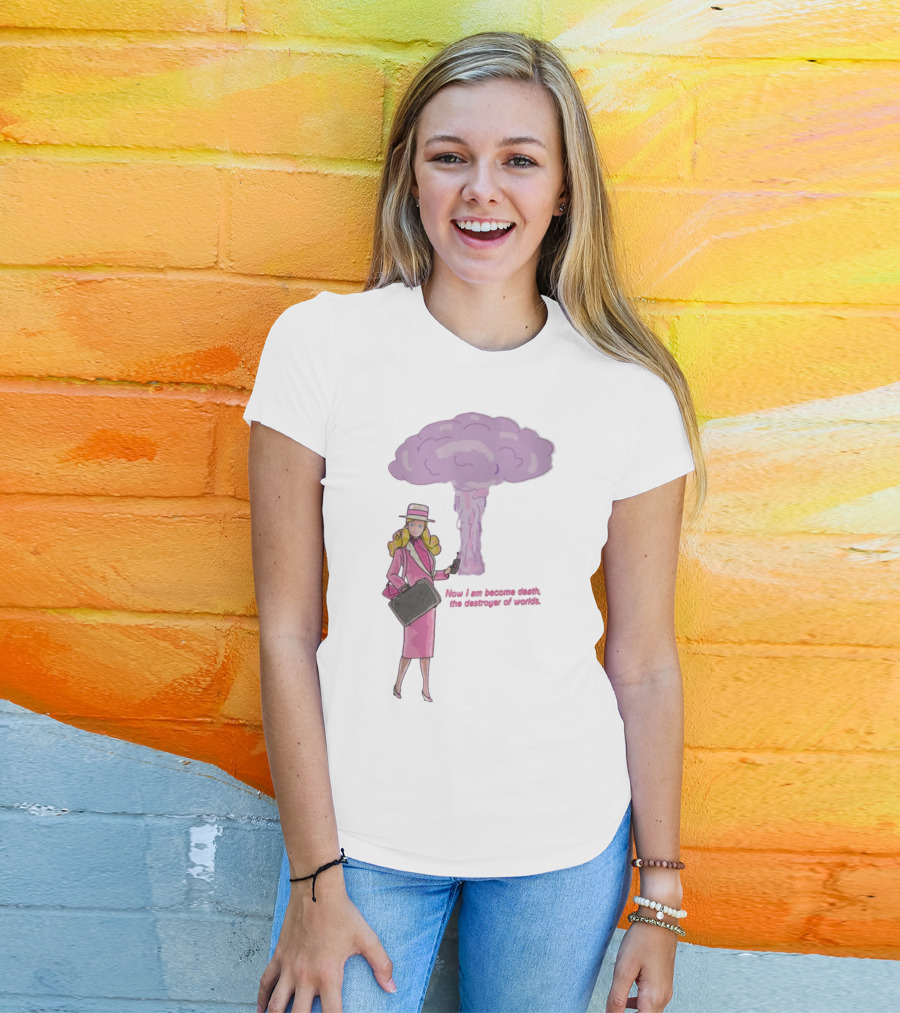 Now I Am Become Death The Destroyer Of Worlds Blonde Woman Pink Outfit Holding Bag Phone With Purple Mushroom Cloud T-Shirt
