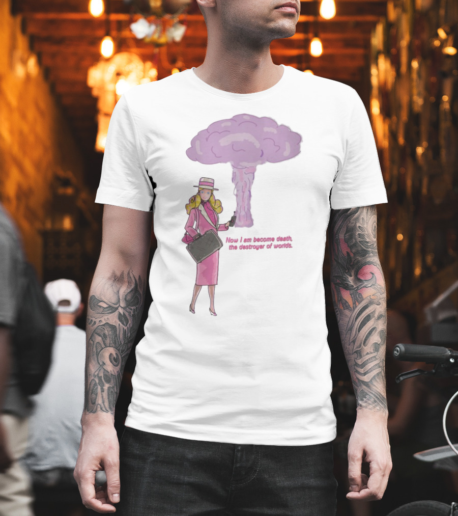 Now I Am Become Death The Destroyer Of Worlds Blonde Woman Pink Outfit Holding Bag Phone With Purple Mushroom Cloud T-Shirt