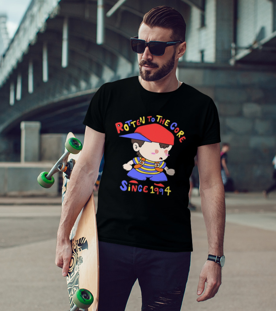 Rotten To The Core Since 1994 Cartoon Character With Red Cap And Striped T-Shirt