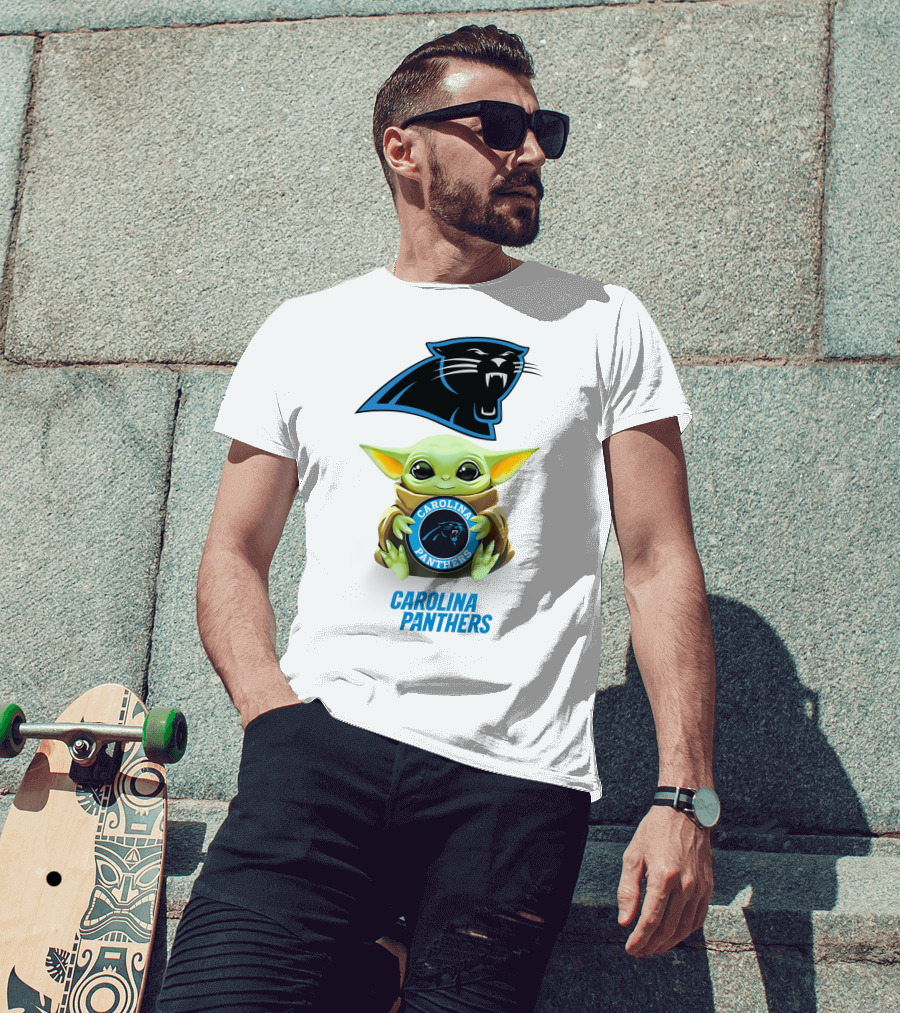 Grogu Holding Carolina Panthers Emblem With Team Logo In White T-Shirt