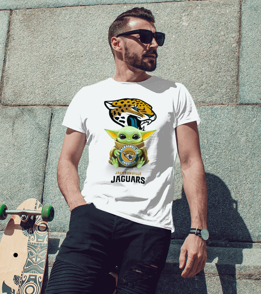 Grogu Holding Jacksonville Jaguars Badge With Mascot In Background T-Shirt