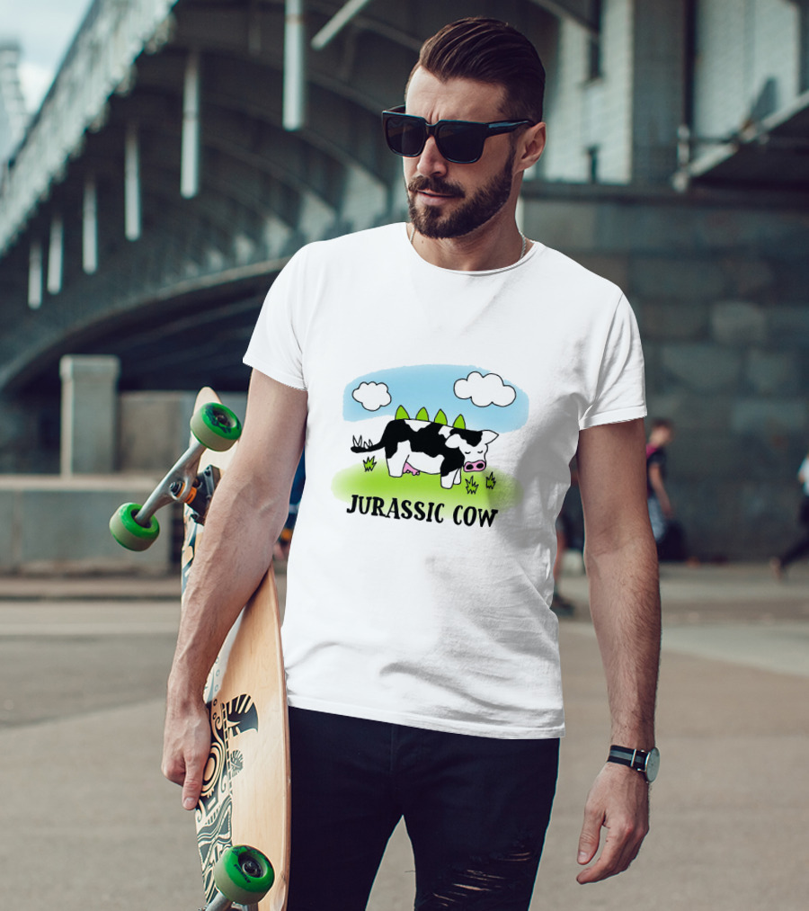 Jurassic Cow Grazing With Dinosaur Spikes Under Blue Sky And Clouds In Cartoon T-Shirt
