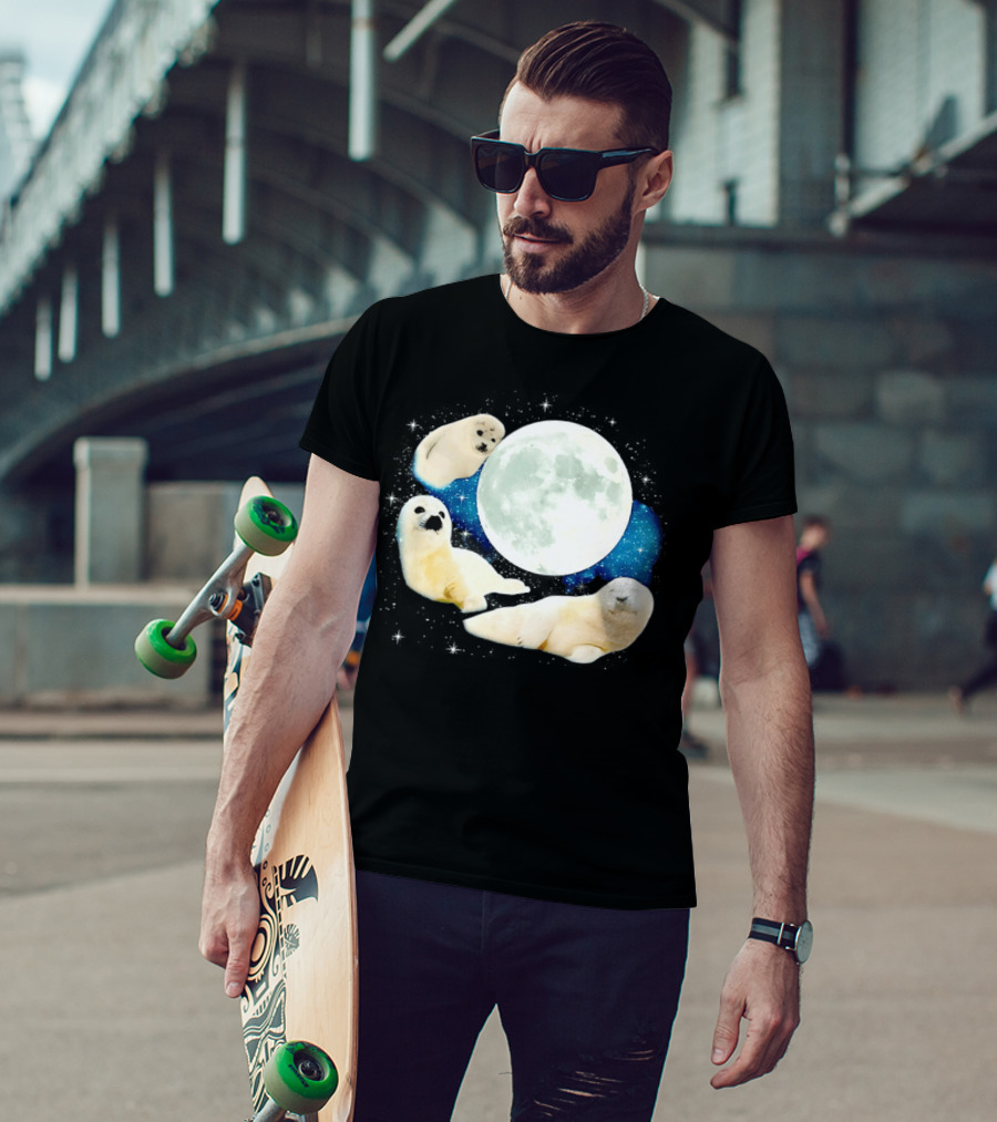 Adorable Seals Playfully Resting Under A Radiant Full Moonlit Sky With Cosmic Backdrop T-Shirt