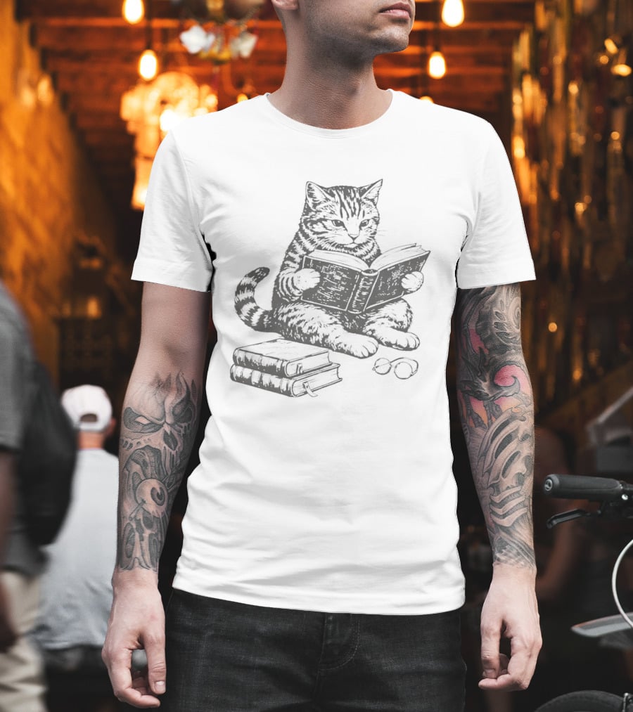 Tabby Cat Sitting and Reading Book with Stacked Books Beneath T-Shirt