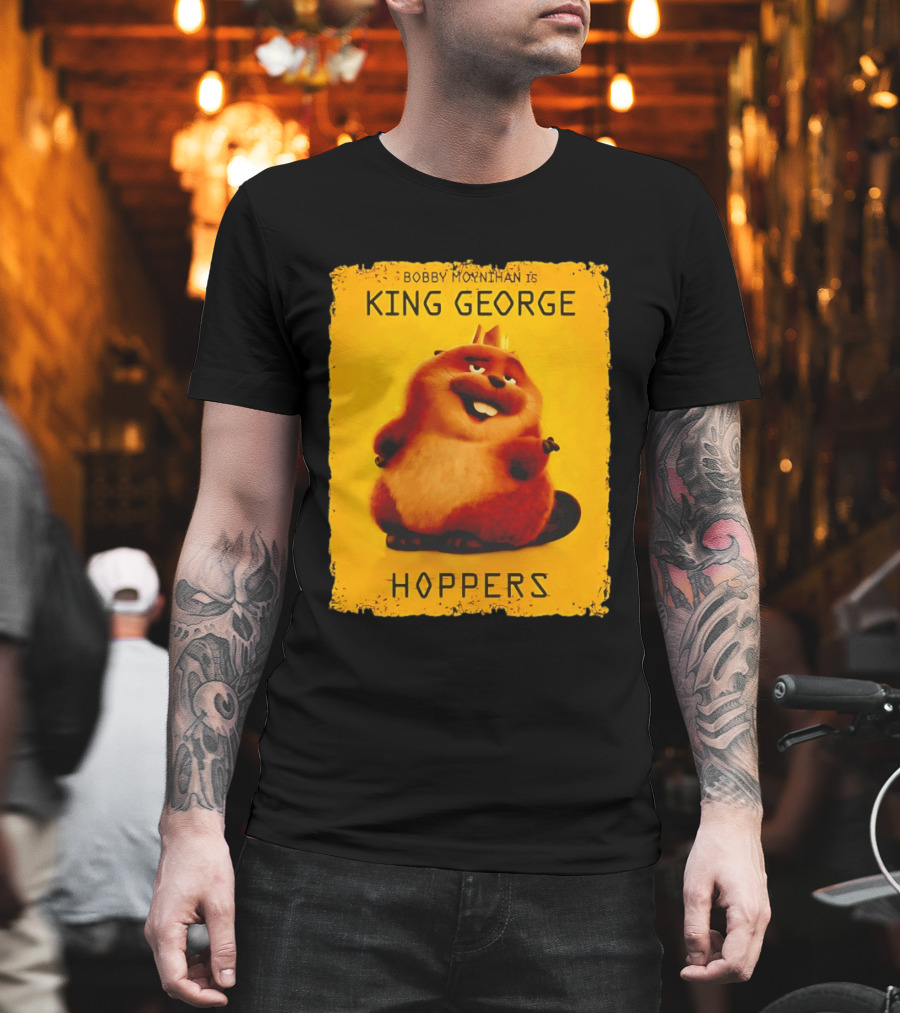 Bobby Moynihan is King George Hoppers Smiling Cartoon Character with Crown on Orange T-Shirt