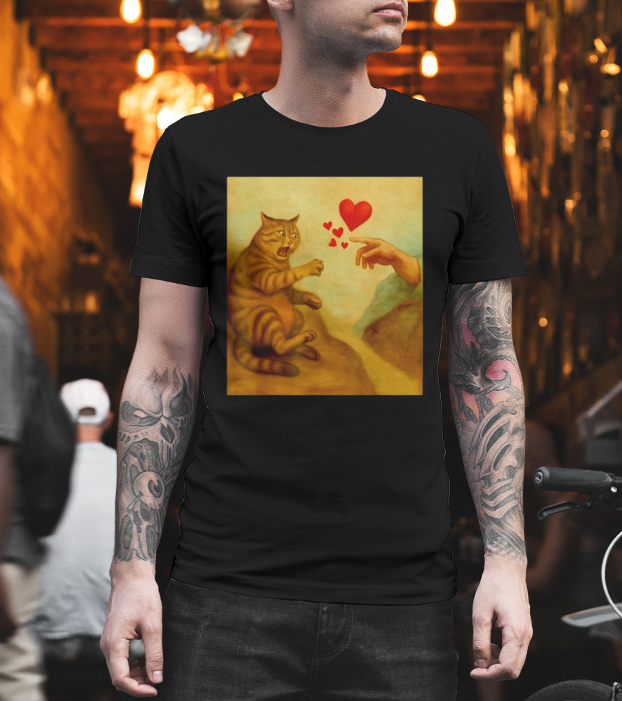 Cat Swatting God's Hand Surrounded by Hearts T-Shirt