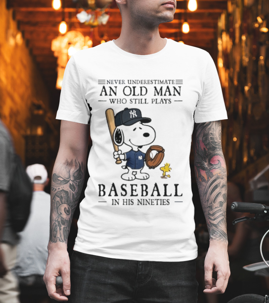 Never Underestimate An Old Man Who Still Plays Baseball In His Nineties Peanuts New York Yankees Collaboration T-Shirt