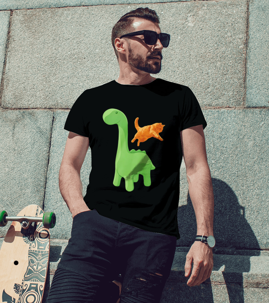 Cat Jumping Over Green Dinosaur Cartoon Image T-Shirt