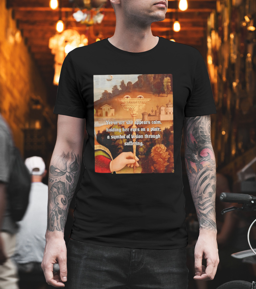 Yet In Art She Appears Calm Holding Her Eyes On A Plate A Symbol Of Vision Through Suffering T-Shirt