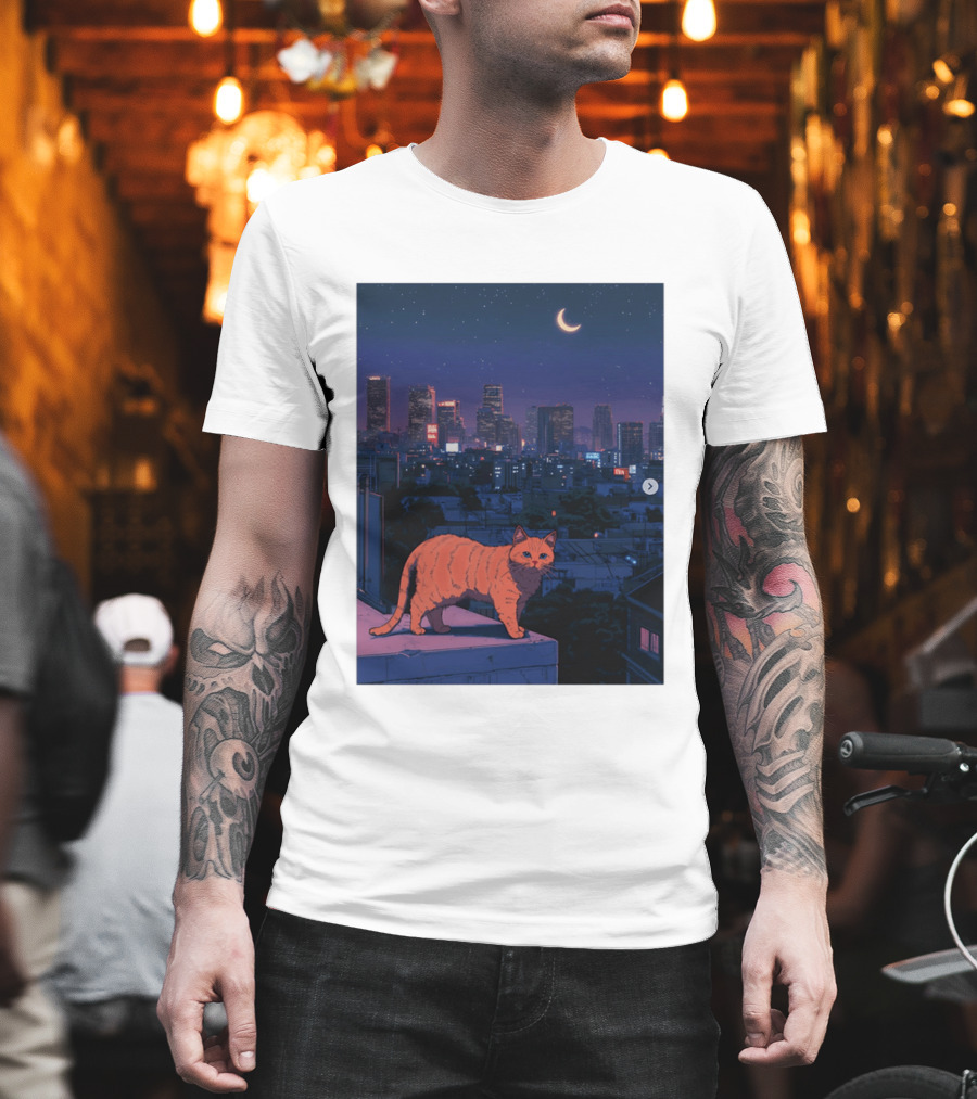 Orange Tabby Cat Under Night Sky Overlooking City Skyline With Crescent Moon T-Shirt