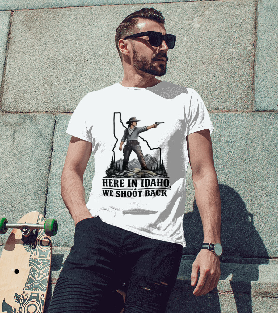 Here In Idaho We Shoot Back Cowboy With Pistol In State Mountains Scene T-Shirt