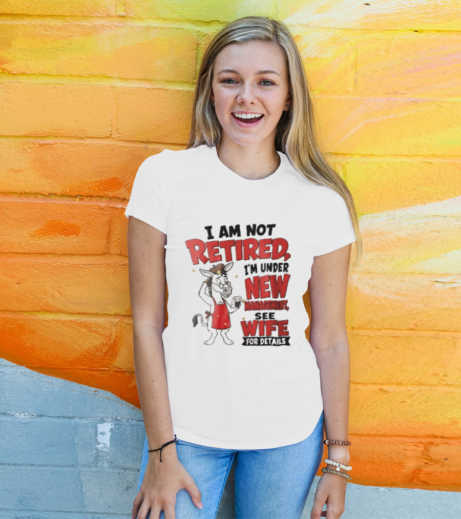 I Am Not Retired I'm Under New Management See Wife For Details Cartoon Donkey Red Apron T-Shirt