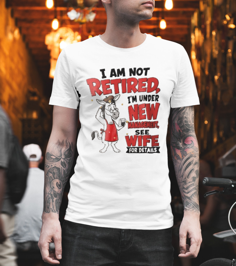 I Am Not Retired I'm Under New Management See Wife For Details Cartoon Donkey Red Apron T-Shirt