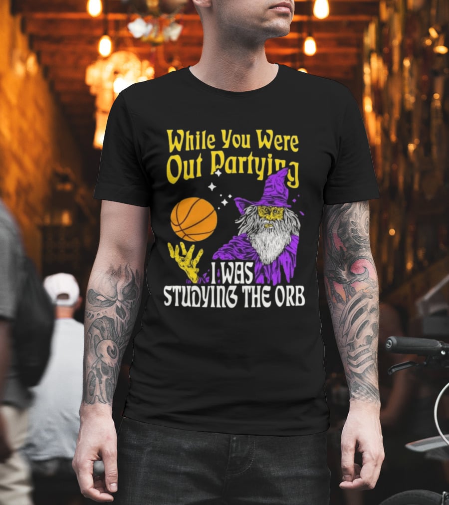 While You Were Out Partying I Was Studying The Orb Wizard Basketball T-Shirt