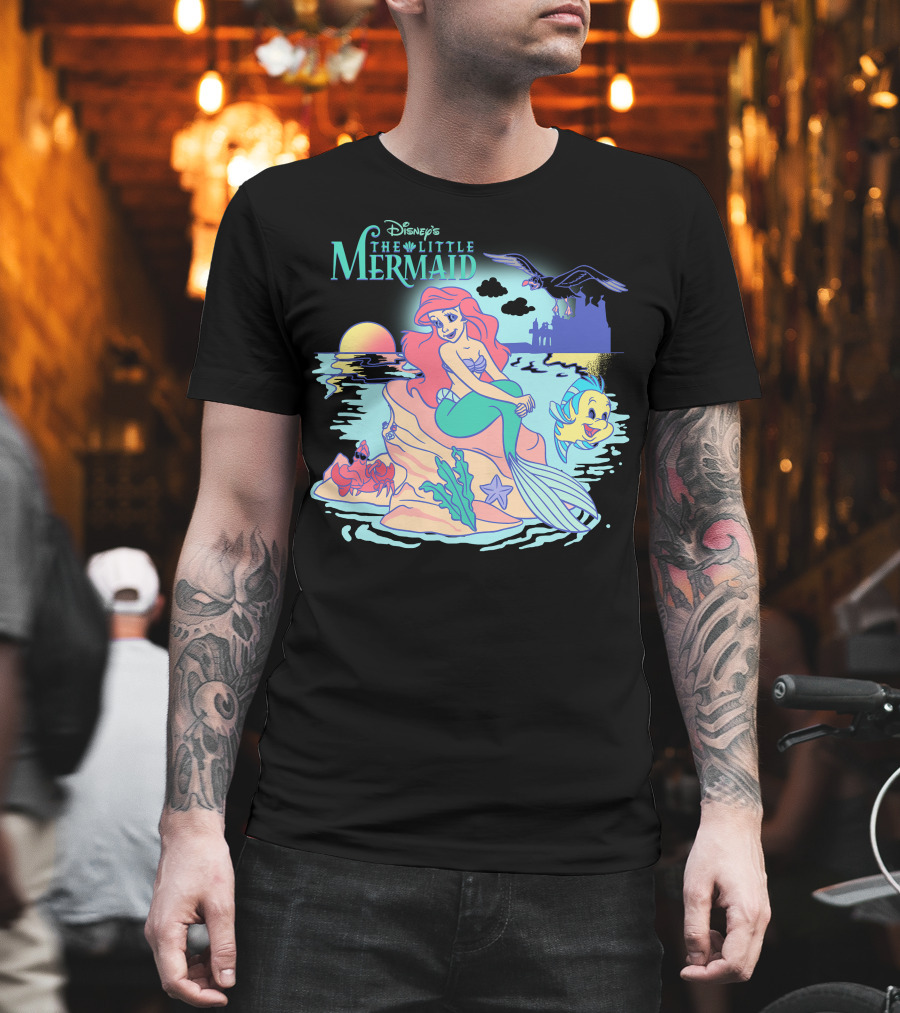 Disney's The Little Mermaid Ariel with Flounder and Sebastian by Castle at Sunset T-Shirt