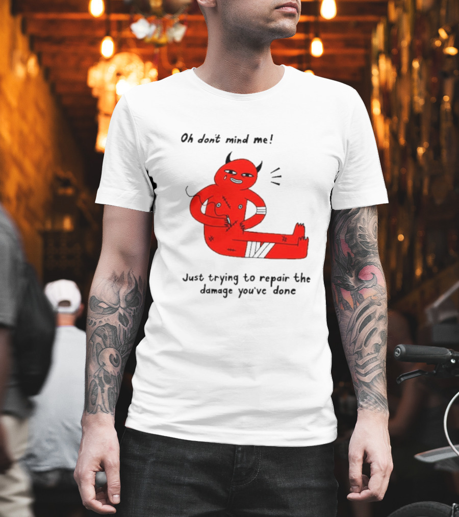 Oh Don’t Mind Me Just Trying to Repair the Damage You’ve Done Red Cartoon Devil Patching Up T-Shirt