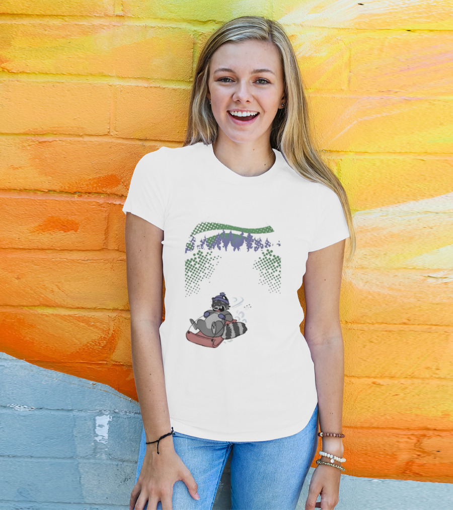 Raccoon Sledding In Winter Forest Scene With Evergreen Trees And Snowflakes T-Shirt