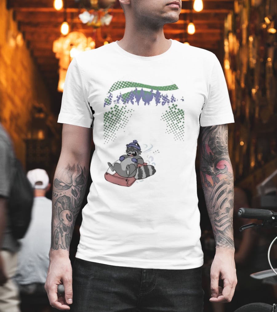 Raccoon Sledding In Winter Forest Scene With Evergreen Trees And Snowflakes T-Shirt