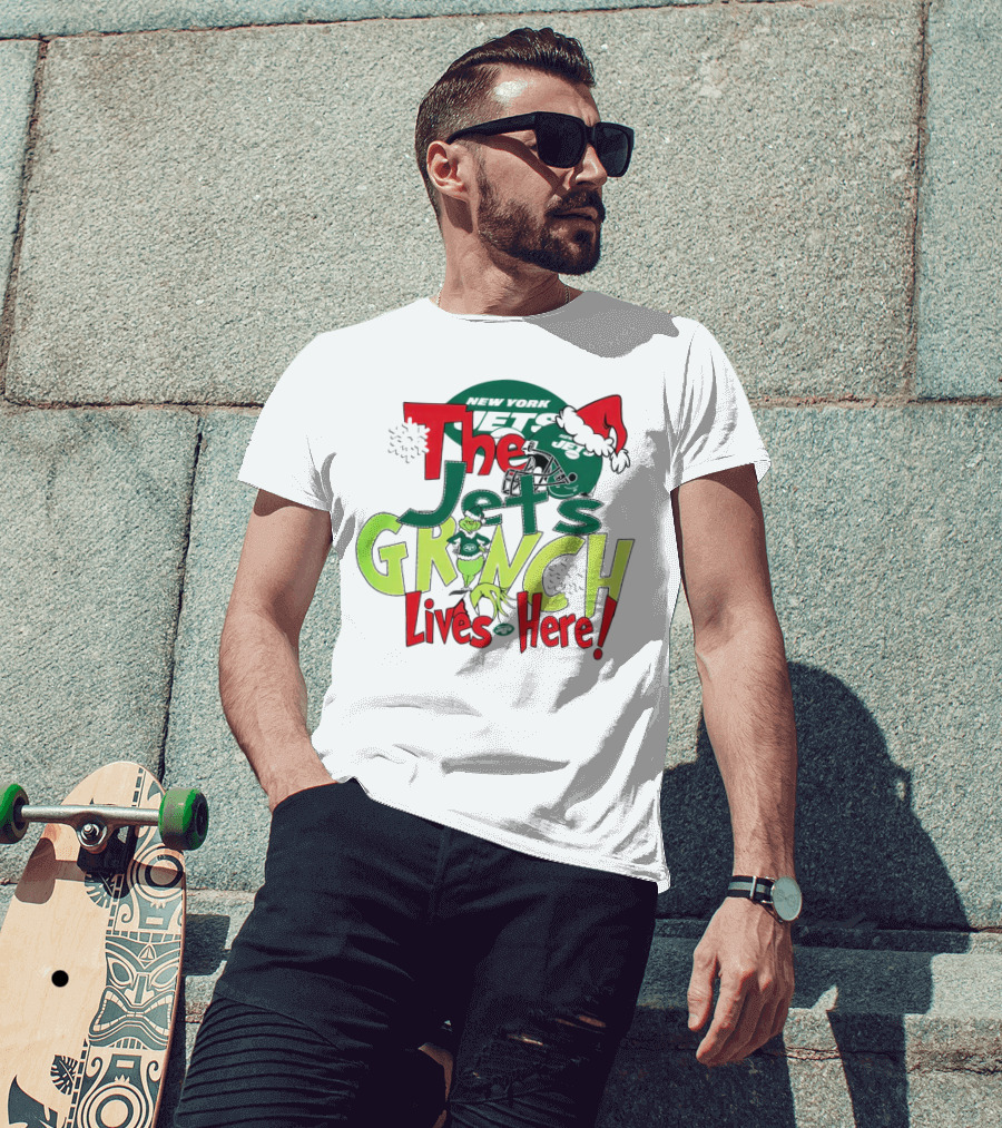 The New York Jets Grinch Lives Here Christmas Festive T-Shirt