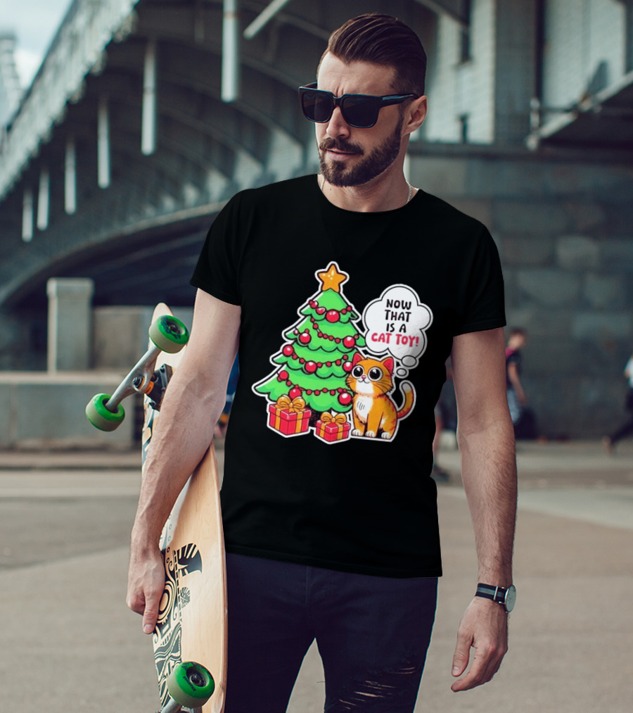 Now That Is A Cat Toy A Cute Orange Cat With Wide Eyes Next To Decorated Christmas Tree T-Shirt