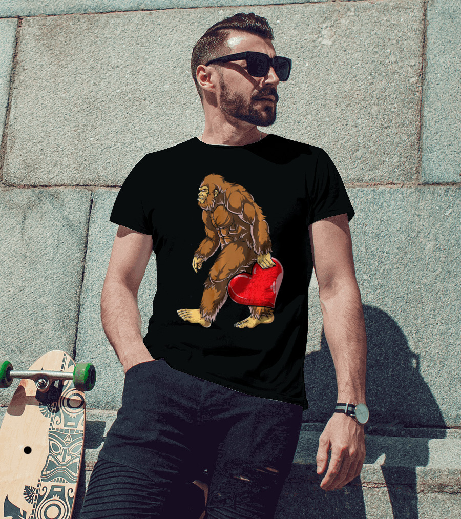 Bigfoot Carrying Heart Funny Valentine's Day T-Shirt