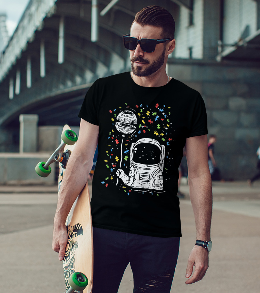 Astronaut Holding Planet Balloon With Puzzle Pieces For Autism Awareness T-Shirt