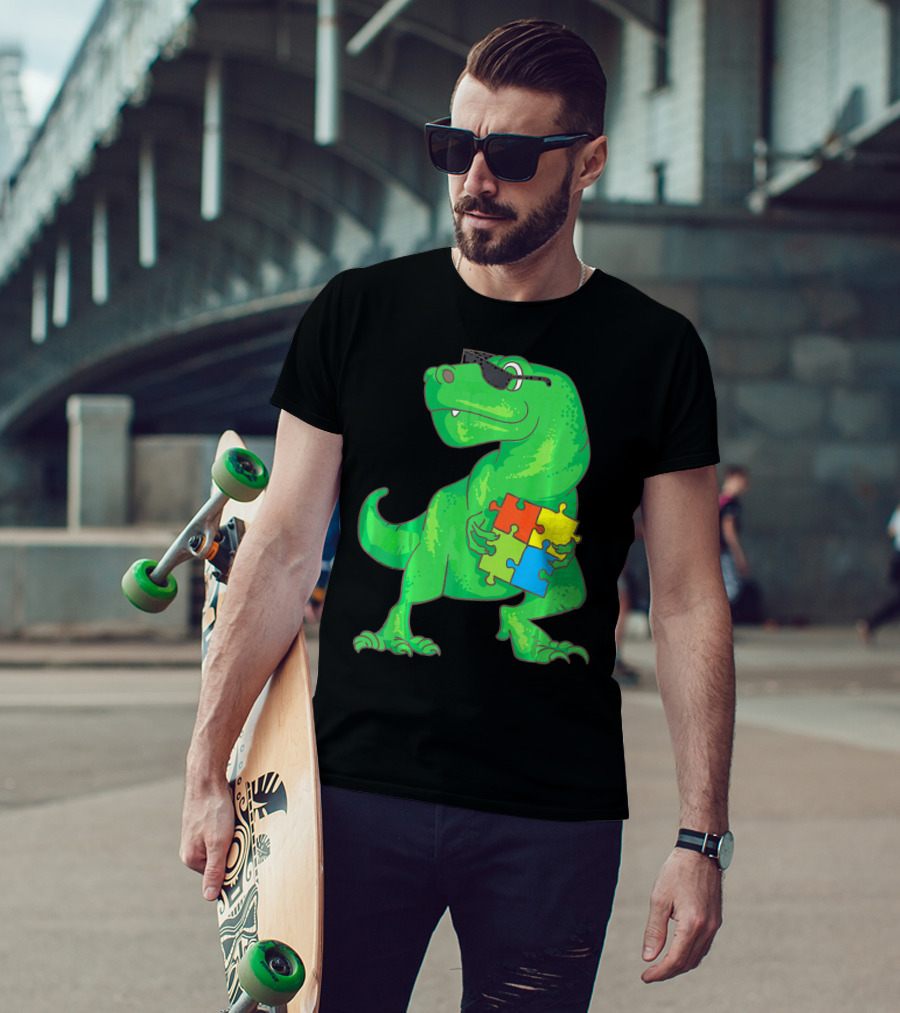 Autism Awareness Month Dinosaur Holding Puzzle Pieces T-Shirt