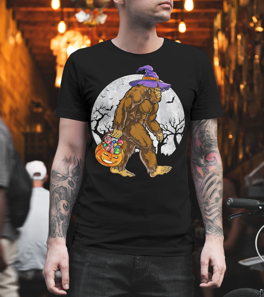 Bigfoot Witch Carrying Pumpkin Candy Basket In Spooky Moonlit Forest T-Shirt